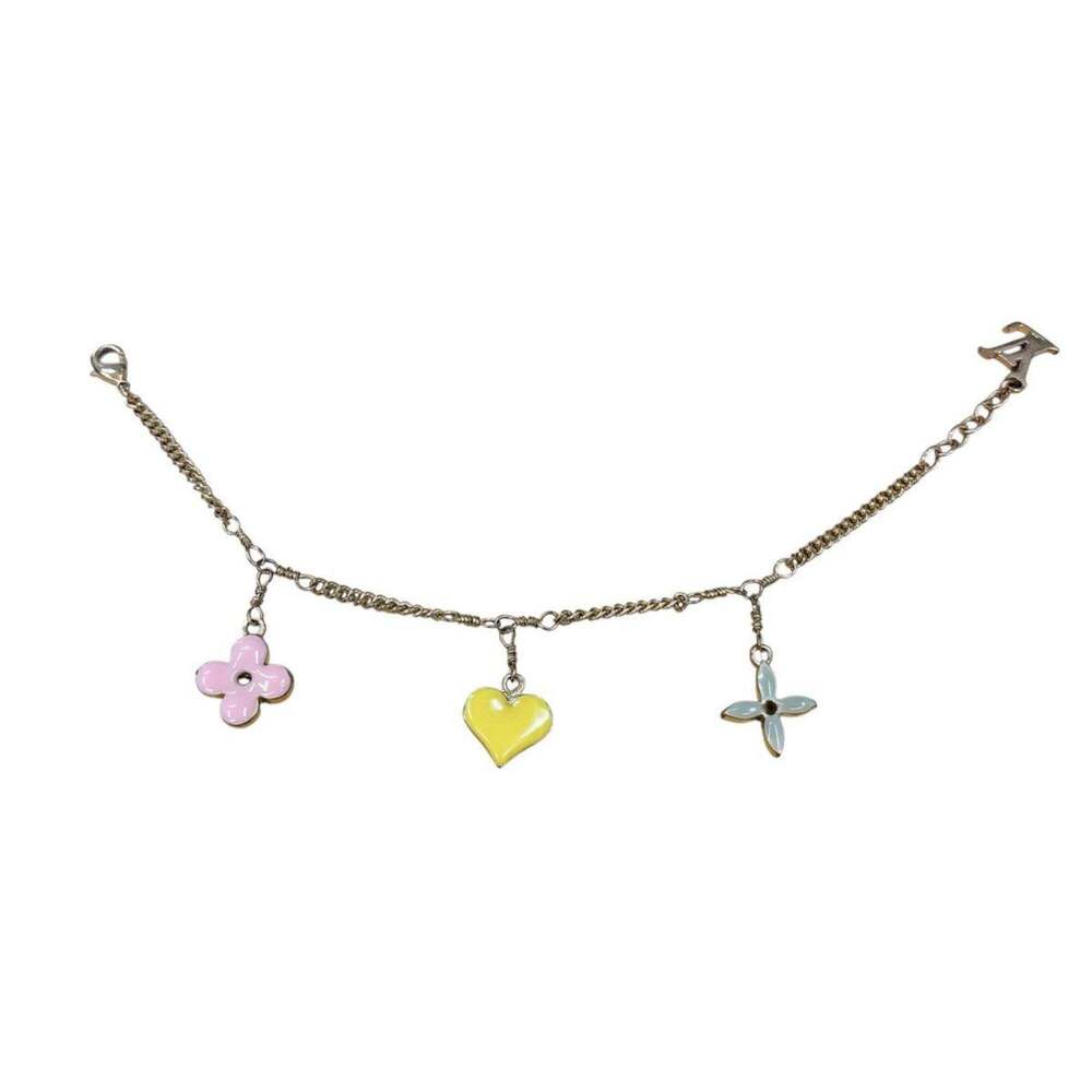 LOUIS VUITTON Gold Monogram Charm Bracelet - Picture 5 of 6